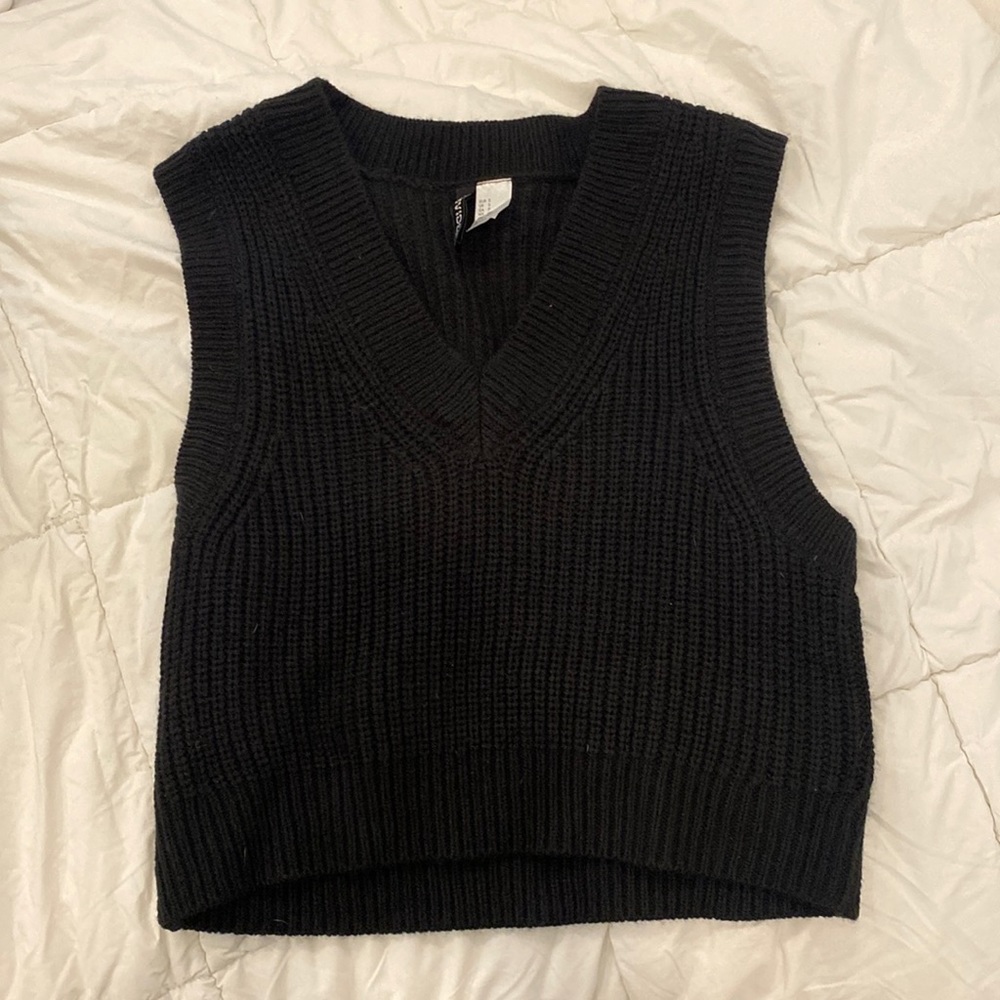 A black top with v neck. Women’s small.